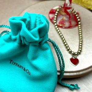 Tiffany & Co. beaded red heart bracelet. Return to Tiffany. # 81